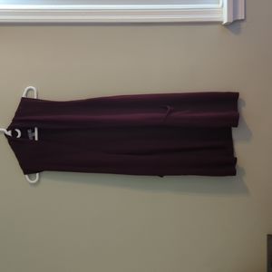 Long sleeveless sweater